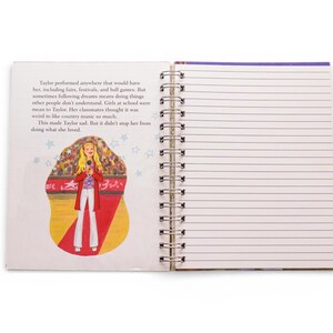 May include: Open spiral notebook with lined pages and a colorful illustration. The illustration depicts a blonde woman in a red coat and white pants holding a microphone on a stage. Text on the left page describes the woman's journey.