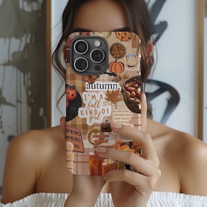 May include: A phone case with a collage of autumn-themed images, including pumpkins, leaves, and a pie. The text "I'm a fall kind of girl" is written on the case.