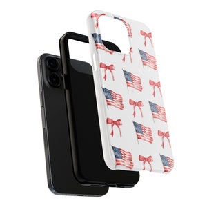 May include: A white phone case with a pattern of red, white, and blue American flags and red bows.