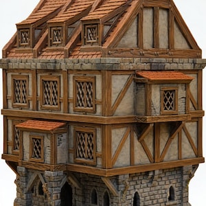 May include: A three-story miniature building featuring a stone ground floor with arched windows and a doorway. The upper levels have timber framing, plaster walls, lattice windows, and a steep roof with three dormers and a chimney.