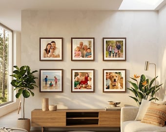 May include: A gallery wall arrangement featuring six square, dark brown wooden frames containing various family photographs, including portraits of adults, children, and a golden retriever, displayed in a two-by-three grid on a light wall.