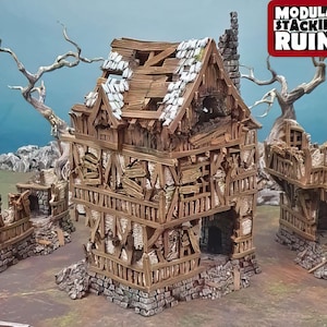 May include: Modular stacking ruins model with detailed wooden structures, including a multi-story building and smaller sections. The buildings are weathered with visible damage, and the text "Modular Stacking Ruins" is displayed. The model is designed for tabletop gaming.