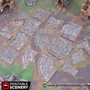 以下が含まれることがあります： テーブルトップゲーム用の、グレーとブラウンのテクスチャ加工が施された、15枚の廃墟となった石のタイルのセットです。タイルは厚くて丈夫な素材で作られており、現実的な廃墟となった都市やダンジョンの設定を作成するのに最適です。