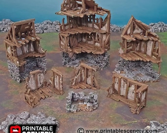 Op de afbeelding: Een verzameling miniatuur, verweerde en vervallen gebouwen. De structuren hebben stenen fundamenten, houten frames en verweerde details, waardoor een realistische, verouderde uitstraling ontstaat. Ideaal voor tabletop gaming of modelscenery.