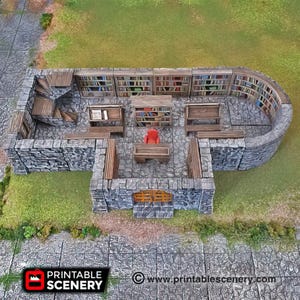 May include: A miniature stone building with a curved roof and a wooden door. The interior is decorated with bookshelves, tables, and chairs. The building is designed for use in tabletop role-playing games.