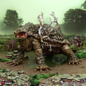 May include: A detailed, fantasy-themed sculpture of a large, reptilian creature with a turtle-like shell covered in moss and tree-like growths. The creature has a wide open mouth and is set in a naturalistic environment with water and foliage.