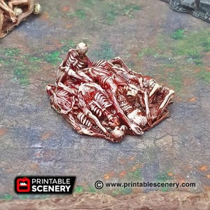 Op de afbeelding: Een stapel rood en wit geschilderde skeletten, een tafelminiaturen voor een fantasy- of rollenspel.