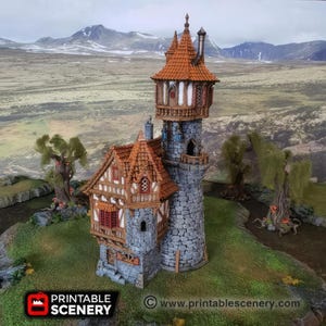May include: A 3D printed model of a stone tower with a brown roof and a small house attached. The tower has a balcony and windows. The model is set against a backdrop of a snowy mountain range.