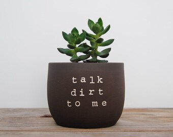 Talk dirt to me. Black pot with dirty humor.