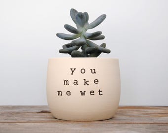 You make me wet. White pot with dirty humor.
