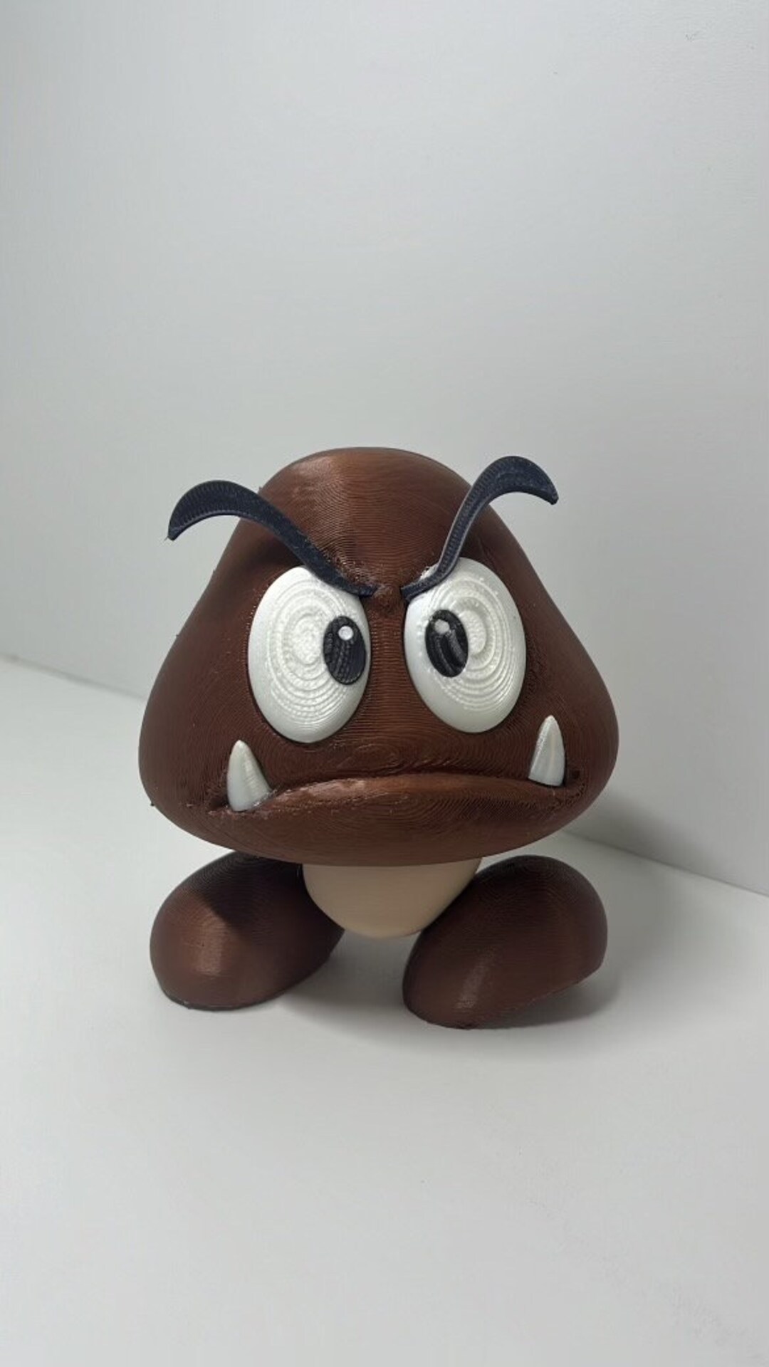 Goomba ぬいぐるみとキノコ型オブジェ il_1080xN.6048283056_m0ar.jpg