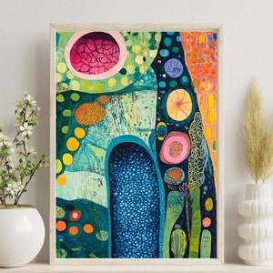 May include: Abstract painting in a white frame with a blue, green, yellow, pink, and orange color scheme. The painting features a variety of shapes and patterns, including circles, dots, and lines.