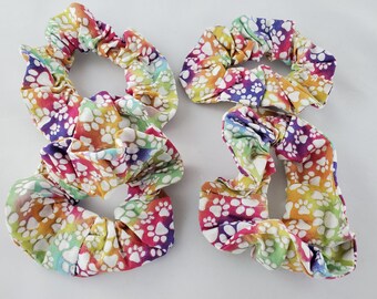 Rainbow And White Paw Prints Hair Tie