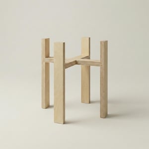 May include: A natural wood plant stand with a four-legged design. The stand is made of light-colored wood and has a simple, modern aesthetic. The stand is designed to hold a potted plant.