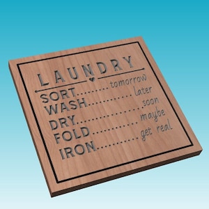 May include: A wooden sign with the word "LAUNDRY" at the top and a list of laundry tasks with humorous completion times: SORT - tomorrow, WASH - later, DRY - soon, FOLD - maybe, IRON - get real.