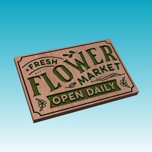 May include: A wooden sign with the text "FRESH FLOWER MARKET OPEN DAILY" in green lettering. The sign has a brown wood grain finish and is angled to the right.