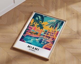 May include: A framed art print featuring a vibrant illustration of Miami, Florida. The artwork depicts palm trees, buildings, and a pool in shades of blue, orange, and pink. The text "MIAMI FLORIDA" is printed at the bottom.