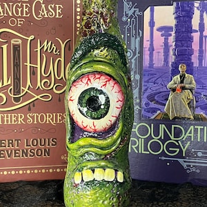 Green Cyclops Horror Monster Clay Sculpture Art Piece, Hand Painted Monster Upcycled Cola Bottle Sculpture Art with Iridescent Green Details