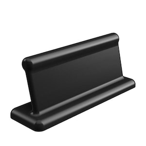 May include: A black plastic desk sign holder with a flat, rectangular surface. The holder is angled for easy viewing.
