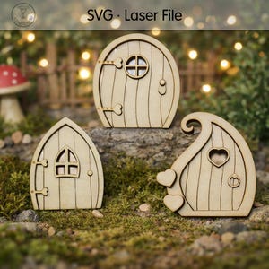 May include: Three light-coloured wooden laser-cut fairy doors with vertical plank detailing. One door is arched with a round window, one is pointed with a small window, and one is asymmetrical with heart-shaped accents and a heart-shaped window.