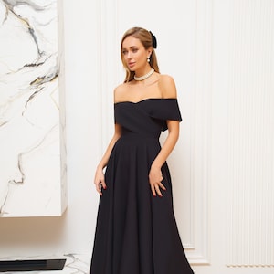 Black off the shoulder fishtail dress on sale