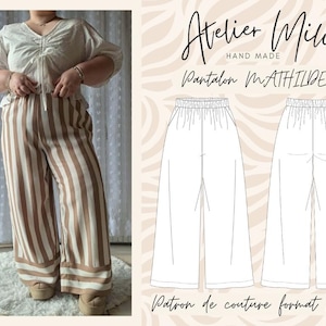 Puede incluir: Pantalones anchos con rayas verticales en beige y blanco, con cintura elástica y dobladillo ancho. La imagen incluye un dibujo técnico de los pantalones con la etiqueta Atelier Milie Hand Made Pantalon Mathilde.
