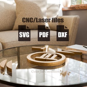 May include: A close-up of a wooden table with a glass top. The table has a wooden circle with the text "Colorful Coexistence" on it. The text "CNC/Laser files" is displayed above three icons: SVG, PDF, and DXF.