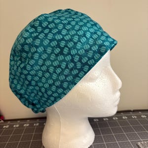 Teal Mini Pumpkins Höstmössa (Euro & Hästsvans)