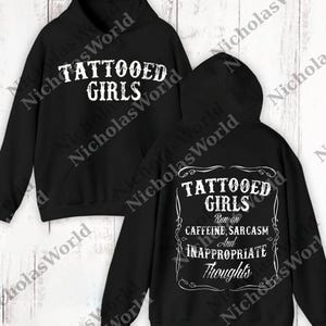 A black hoodie with white text and graphics printed on it.