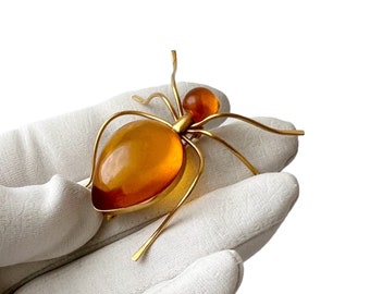 Vintage Baltische honing-amber spin broche. Verguld. Kaliningrad Amber Combine, USSR, jaren 80.