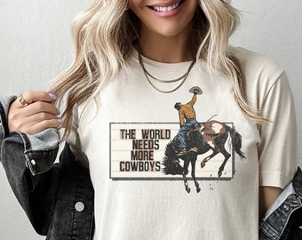 The World Needs More Cowboys Tshirt Bull Bronco, Western, Rodeo, Bronco, Cowboy Life, wild free, adventure, country, tee, cowgirl