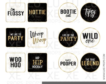 May include: A set of 12 black and white round and square party favour stickers with gold glitter accents. The stickers feature phrases like "I'm Flossy", "Hottie", "Bootie Call", "Tisty", "We Like to Party", "Whoop Whoop", "Life of the Party", "Wild One", "Woo Hoo", "Hip Hip Hooray", "Party Pooper", and "The True Legend".