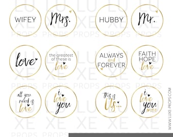 May include: Set of 10 round gold-rimmed white circle stickers with black text. The text includes phrases like "Wifey", "Mr.", "Love", "Always and Forever", "Faith Hope Love", "I Love You More", and "This is Us..."