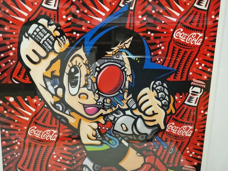 May include: A colorful illustration of a robot boy with a red eye and blue hair, surrounded by red and white Coca-Cola bottles.