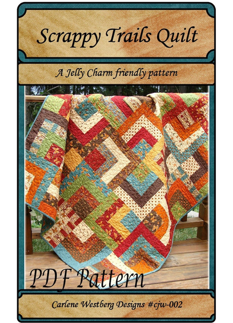 May include: A PDF pattern for a Scrappy Trails Quilt, a Jelly Charm friendly pattern. The quilt is made with a variety of colorful fabrics in a geometric design. The quilt is draped over a wooden railing.