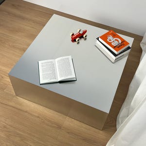 Stainless steel table. Coffee table. Modern table. Side table. Living room table.
