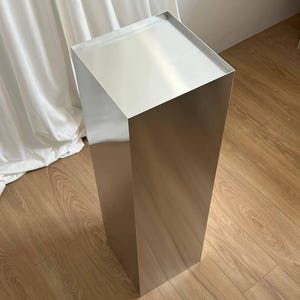 Aluminum stand. Side table. Designer furniture. Home decor. Metal table. Stainless steel table.