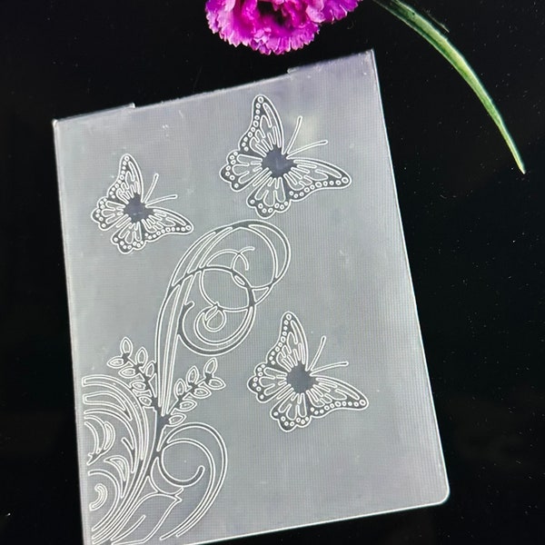 Brand New Never Used Embossing Folder. Butterflies With Corner Floral Scroll