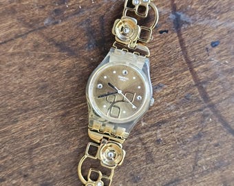Vintage 2019 Gold-Tone Swatch Watch With Flower and CZ Band