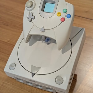 Support d&#39;affichage pour console Sega Dreamcast