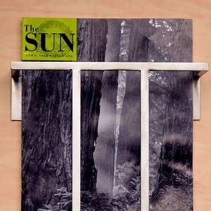 Minimal Steel Magazine Rack: Modern Wall Mount Holder