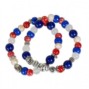 May include: Two beaded bracelets with blue, red, white, and silver beads. One bracelet spells out the word "BILLS" with silver letter beads. The bracelets are on a white background.