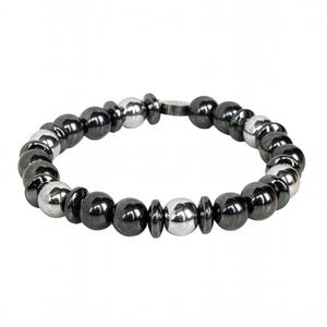 May include: A beaded bracelet featuring alternating dark gray and silver-colored beads. The bracelet is made of round beads and has a clasp closure. The beads are approximately 0.5 inches in diameter. The bracelet is displayed against a white background.