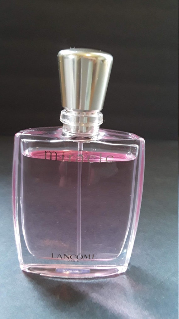 Beautiful 1.7 ounce Lancome Paris "Miracle" perfume, lovely elegant bottle, wonderful fragrance, nearly full, in perfect condition