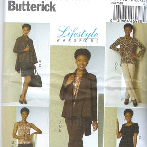 May include: A sewing pattern for a women's wardrobe featuring four different outfits. The pattern is for sizes 14-16-18-20-22. The outfits include a jacket and pants, a top and pants, a top and skirt, and a dress. The pattern is from Butterick and is called "Lifestyle Wardrobe".