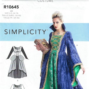 Puede incluir: Un patrón de costura para un disfraz con un vestido azul y verde y una capa larga azul. El patrón es para las tallas 6-14. El patrón se llama Simplicity R10645.