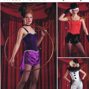 May include: A sewing pattern for three different circus costumes. The first costume is a white and black clown costume. The second costume is a red and black ringmaster costume. The third costume is a purple and black trapeze artist costume. The pattern is for sizes 14-22.