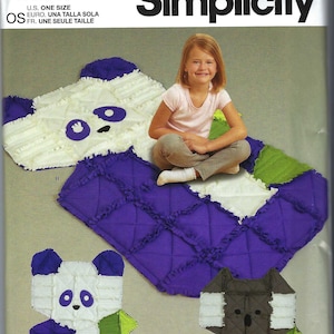 Puede incluir: Un patrón de costura para un panda, un koala y una manta. El patrón es de Simplicity y es para una talla. El patrón incluye instrucciones para hacer una manta con forma de panda y koala.