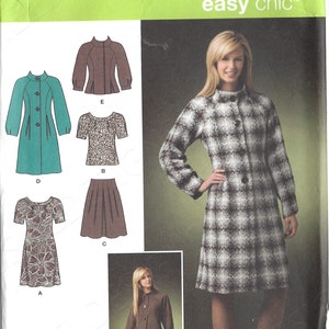 May include: A sewing pattern for a women's coat, skirt, and blouse. The pattern is for sizes D5 4, 6, 8, 10, and 12. The pattern is from Simplicity and is part of their easy chic line.