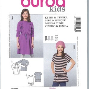May include: Burda Kids sewing pattern 9453 for a dress and tunic with instructions in German, English, French, Spanish, and Italian. The pattern includes sizes 7-13 (junior) and 122-158 cm. The pattern includes seam and hem allowances.